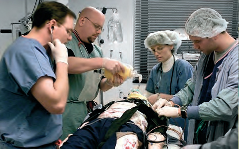 Hospital staff working on the first SimMan, launched in 2002.